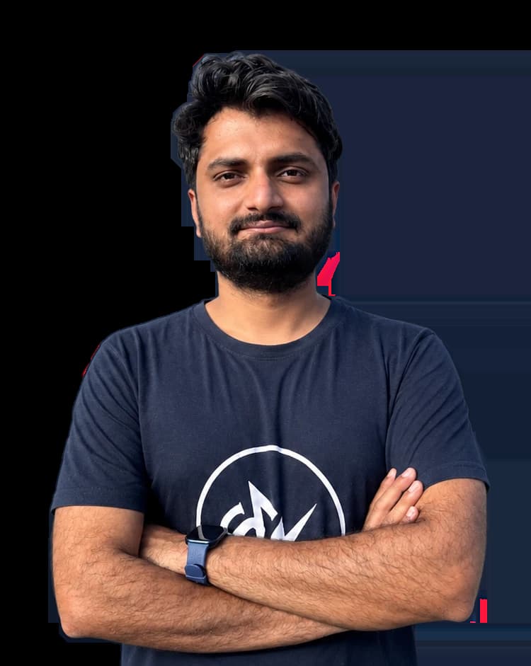 Spark AI's founder, standing with his arms folded